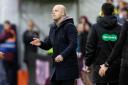 Hearts head coach Steven Naismith gives instructions during his side's clash with Motherwell