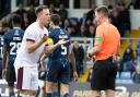 Lawrence Shankland was booked for an adjudged dive against Ross County by referee Grant Irvine