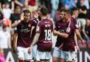 Hearts players celebrate Kenneth Vargas' opening goal