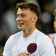Aidan Denholm has signed a new deal that will keep him at Hearts until the summer of 2026