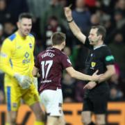 Alan Forrest was booked by referee Alan Muir who judged the Hearts star to have dived trying to win a penalty