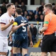 Lawrence Shankland was booked for an adjudged dive against Ross County by referee Grant Irvine