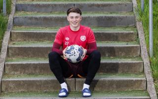 Aidan Denholm says that the thrill of being a first-team player at Hearts still hasn't worn off